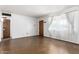 Living room with large windows that let in natural light and freshly painted walls at 3247 E Sheridan St, Phoenix, AZ 85008