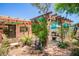 Charming outdoor patio area with pergola cover, lush plants, and comfortable seating creating a tranquil retreat at 3247 E Sheridan St, Phoenix, AZ 85008