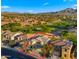 Aerial view of the property highlights its location in a golf course community with mountain views at 3277 E Meadowview Dr, Gilbert, AZ 85298