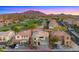 Beautiful property with a two-car garage and desert landscaping in a premier golf community, nestled with mountain views at 3277 E Meadowview Dr, Gilbert, AZ 85298