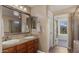 Bathroom with double sinks and a separate tub and shower at 3277 E Meadowview Dr, Gilbert, AZ 85298