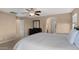 A bedroom with neutral walls, ceiling fan and furnishings at 3277 E Meadowview Dr, Gilbert, AZ 85298