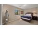 Bedroom with neutral colored walls, window with a view and natural light at 3277 E Meadowview Dr, Gilbert, AZ 85298