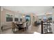 The dining area with cozy chairs and stairs to second story at 3277 E Meadowview Dr, Gilbert, AZ 85298