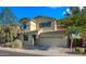 Charming home with a two-car garage, beautiful stone accents, and desert landscaping providing curb appeal at 3277 E Meadowview Dr, Gilbert, AZ 85298