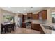Kitchen and dining nook showcasing the stainless appliances, granite counters and dining table at 3277 E Meadowview Dr, Gilbert, AZ 85298