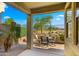 Covered patio with an outdoor dining set perfect for enjoying meals with a view at 3277 E Meadowview Dr, Gilbert, AZ 85298
