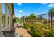 Charming patio with seating, greenery, and tranquil golf course views at 3277 E Meadowview Dr, Gilbert, AZ 85298