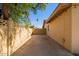 Spacious backyard with a concrete patio area and privacy walls, perfect for outdoor entertaining at 3536 W Cholla St, Phoenix, AZ 85029