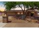Charming brick home featuring a well-manicured front yard and two-car garage at 3536 W Cholla St, Phoenix, AZ 85029