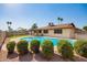 Relaxing backyard with a private pool and mature landscaping that provides shade and beauty at 3901 W Augusta Ave, Phoenix, AZ 85051