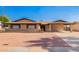 Charming single-story brick home featuring a carport and low-maintenance desert landscaping at 3901 W Augusta Ave, Phoenix, AZ 85051
