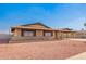 Charming single-story brick home featuring a carport and low-maintenance desert landscaping at 3901 W Augusta Ave, Phoenix, AZ 85051