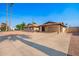 Charming single-story brick home featuring a carport and low-maintenance desert landscaping at 3901 W Augusta Ave, Phoenix, AZ 85051