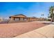 Charming single-story brick home featuring a carport and low-maintenance desert landscaping at 3901 W Augusta Ave, Phoenix, AZ 85051