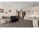 Cozy living room with hardwood floors, comfortable seating, and natural light at 3901 W Augusta Ave, Phoenix, AZ 85051