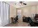 Office area featuring neutral walls, tile flooring, and natural light at 42277 W Chisholm Dr, Maricopa, AZ 85138