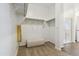 Spacious walk-in closet with ample shelving and a cozy bench for comfort at 46422 W Lander Ln, Maricopa, AZ 85139