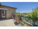 Enjoy the view of the water from this charming balcony with stone accents and a metal railing at 4700 S Fulton Ranch Blvd # 62, Chandler, AZ 85248