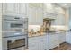 Gourmet kitchen showcasing stainless steel appliances, granite counters, and custom cabinets at 4700 S Fulton Ranch Blvd # 62, Chandler, AZ 85248