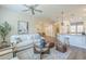 Bright and airy living room with contemporary furnishings, a ceiling fan, and an open floor plan at 4700 S Fulton Ranch Blvd # 62, Chandler, AZ 85248