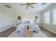 Serene main bedroom with a ceiling fan, a plush bed, and ample natural light at 4700 S Fulton Ranch Blvd # 62, Chandler, AZ 85248