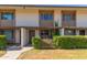 Inviting townhome exterior featuring private entrances, lush landscaping and a well-maintained lawn at 4701 N 68Th St # 214, Scottsdale, AZ 85251
