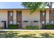 Complex facade with greenery and a courtyard at 4701 N 68Th St # 214, Scottsdale, AZ 85251