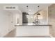Modern kitchen featuring sleek countertops, stainless steel appliances, and ample cabinet space at 4701 N 68Th St # 214, Scottsdale, AZ 85251
