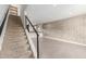 Open-concept living room boasts modern finishes, a staircase, and an accent brick wall at 4701 N 68Th St # 214, Scottsdale, AZ 85251