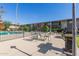 The complex features a community pool, lounge chairs, and a grilling area at 4701 N 68Th St # 214, Scottsdale, AZ 85251