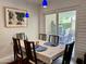 Bright dining room features a large window, blue lighting and a decorated table at 4800 N 68Th St # 164, Scottsdale, AZ 85251