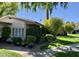 Landscaped home exterior with a well-maintained lawn, trimmed bushes and healthy foliage at 4800 N 68Th St # 164, Scottsdale, AZ 85251