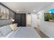 Comfortable bedroom featuring hardwood floors and a wall-mounted television at 4800 N 68Th St # 207, Scottsdale, AZ 85251