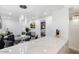Bright living room featuring wood flooring, a dining area, and an open floor plan at 4800 N 68Th St # 207, Scottsdale, AZ 85251