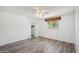 Spacious bedroom features sleek floors, ample natural light, and a convenient walk-in closet at 500 E Hermosa Dr, Tempe, AZ 85282