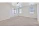 Spacious bedroom with neutral carpet and windows with blinds for natural light at 6815 W Carter Rd, Laveen, AZ 85339