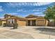 Charming single-Gathering home featuring a three-car garage, neutral paint, and well-maintained landscaping at 6815 W Carter Rd, Laveen, AZ 85339