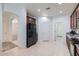 Bright kitchen showcasing wood cabinets, granite countertops, and black appliances at 6815 W Carter Rd, Laveen, AZ 85339