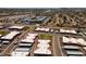 Aerial view of modern community showcasing manicured landscaping, streets, and buildings at 6936 E 4Th St # 5, Scottsdale, AZ 85251