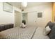 Serene bedroom with closet storage and views to the living area, perfect for relaxation and privacy at 6936 E 4Th St # 5, Scottsdale, AZ 85251