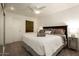 Comfortable bedroom boasting soft lighting and a ceiling fan for a relaxing and inviting ambiance at 6936 E 4Th St # 5, Scottsdale, AZ 85251