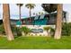 Charming condo complex with well-manicured lawn and distinctive turquoise accents at 6936 E 4Th St # 5, Scottsdale, AZ 85251