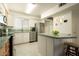 This bright kitchen offers modern stainless steel appliances, ample storage, and a cozy breakfast bar at 6936 E 4Th St # 5, Scottsdale, AZ 85251