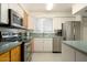 This kitchen includes modern appliances, stylish cabinets, and ample countertop space for all your needs at 6936 E 4Th St # 5, Scottsdale, AZ 85251