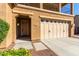 The home's facade includes a two-car garage, decorative front door, and well-maintained landscaping at 7039 W Katharine Way, Peoria, AZ 85383