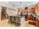 Well-equipped kitchen with tile flooring, granite countertops, and stainless steel appliances at 7039 W Katharine Way, Peoria, AZ 85383
