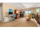 Inviting loft area with built-in desks, cabinets, and an inviting leather chair, perfect for a home office at 7039 W Katharine Way, Peoria, AZ 85383