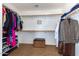Organized walk-in closet with ample shelving and hanging space for clothes and accessories at 7039 W Katharine Way, Peoria, AZ 85383