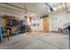 Spacious garage featuring built-in cabinets, ample storage space, and a clean, organized layout at 7227 E Kramer St, Mesa, AZ 85207